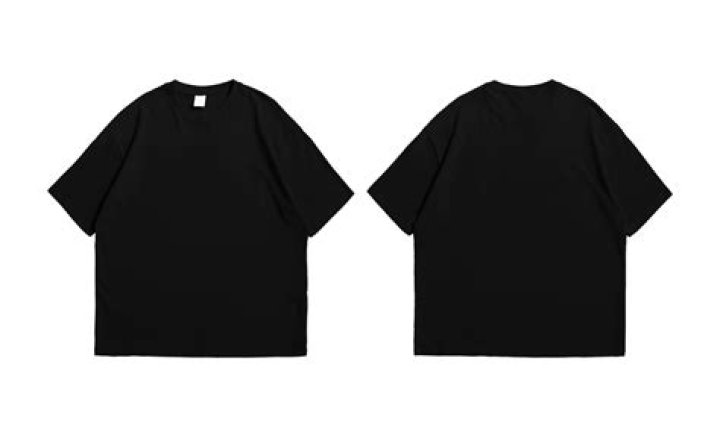 a black t shirt with a picture of a person on it a black t shirt with a picture of a person on it