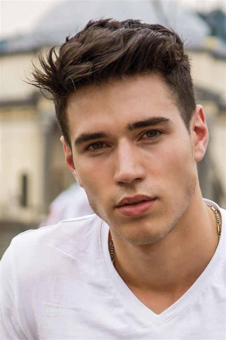 a young man with a serious expression a young man with a serious expression