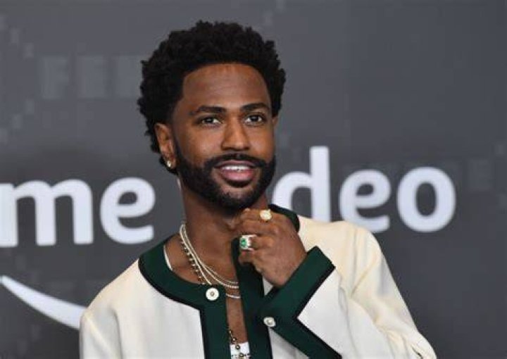 Big Sean arrives for the Savage X Fenty Show wearing black and white