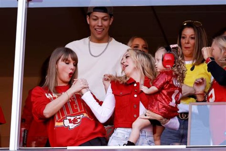 Brittany Mahomes and Taylor Swift celebrate a touchdown by the Kansas City Chiefs against the Denver Broncos
