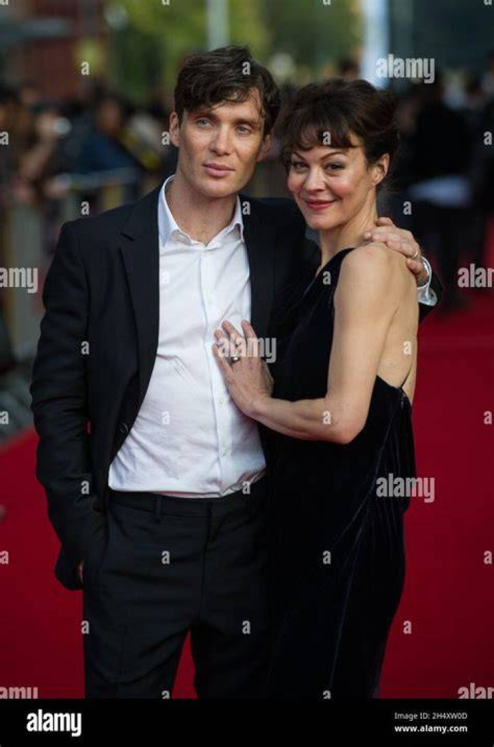 Cillian Murphy and Helen McCrory, Thomas Shelby and Polly Gray from 'Peaky Blinders' Season 6, sitting next to each other at an event