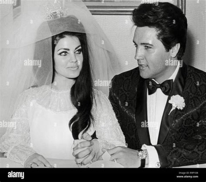 Elvis Presley and Priscilla Presley at their wedding