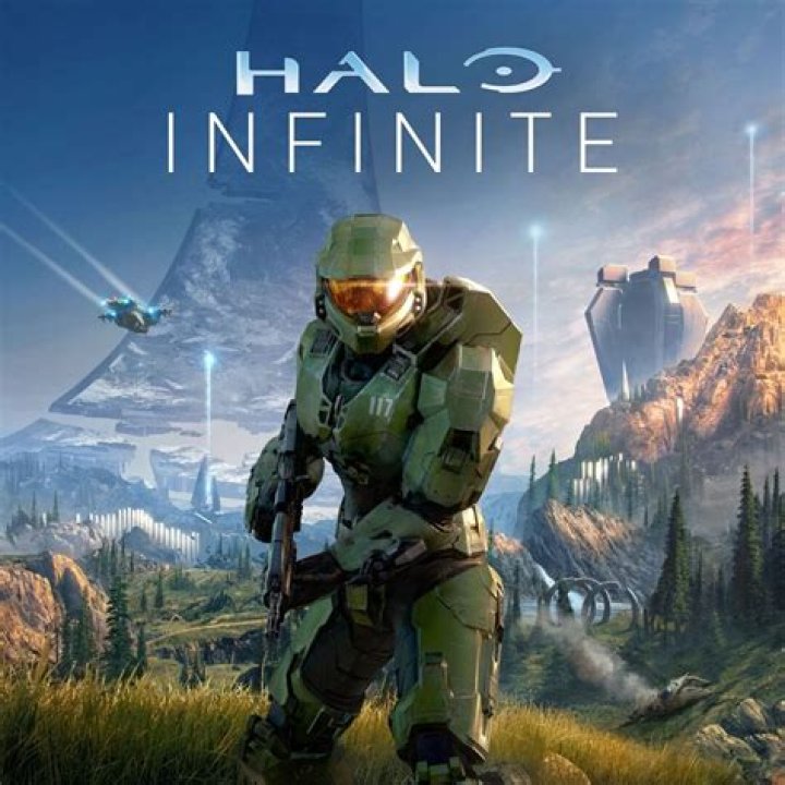 Halo Infinite's Banished chieftain as a hologram shouting at Master Chief.