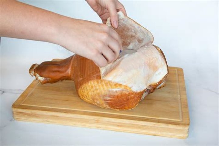 How do I remove a country ham hock?
