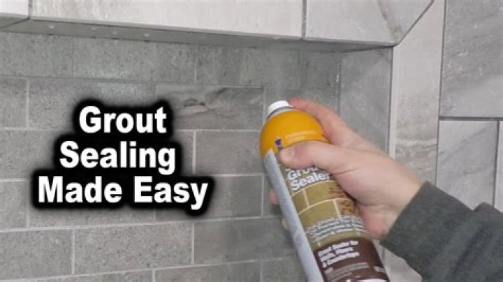 How do you prevent bubbles in grout?