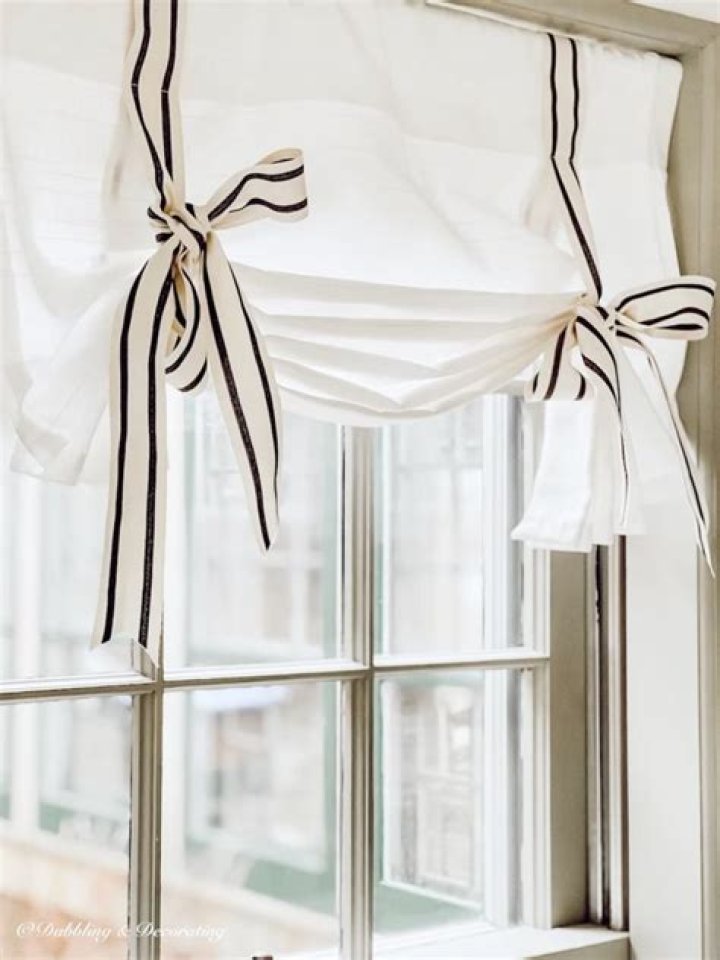 How do you put up tie up curtains?
