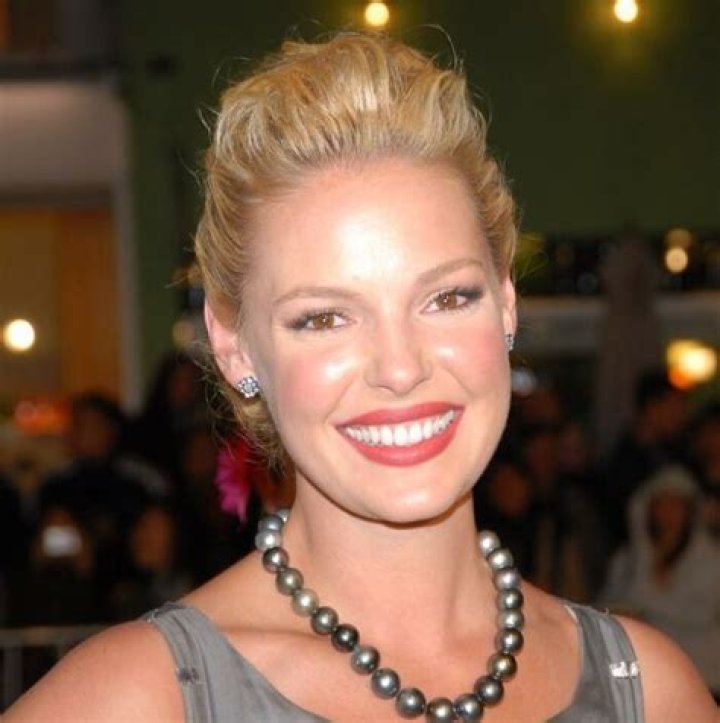 Katherine Heigl smiling at a man in 'Love Comes Softly'