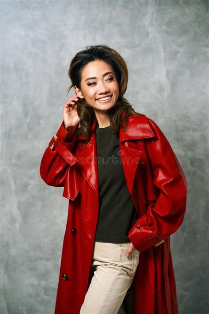 Lucille wearing a red coat in 'Call the Midwife' Season 11