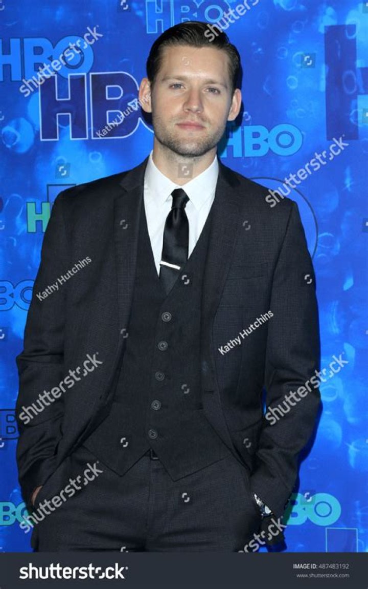 Luke Kleintank wears a black shirt at a media event