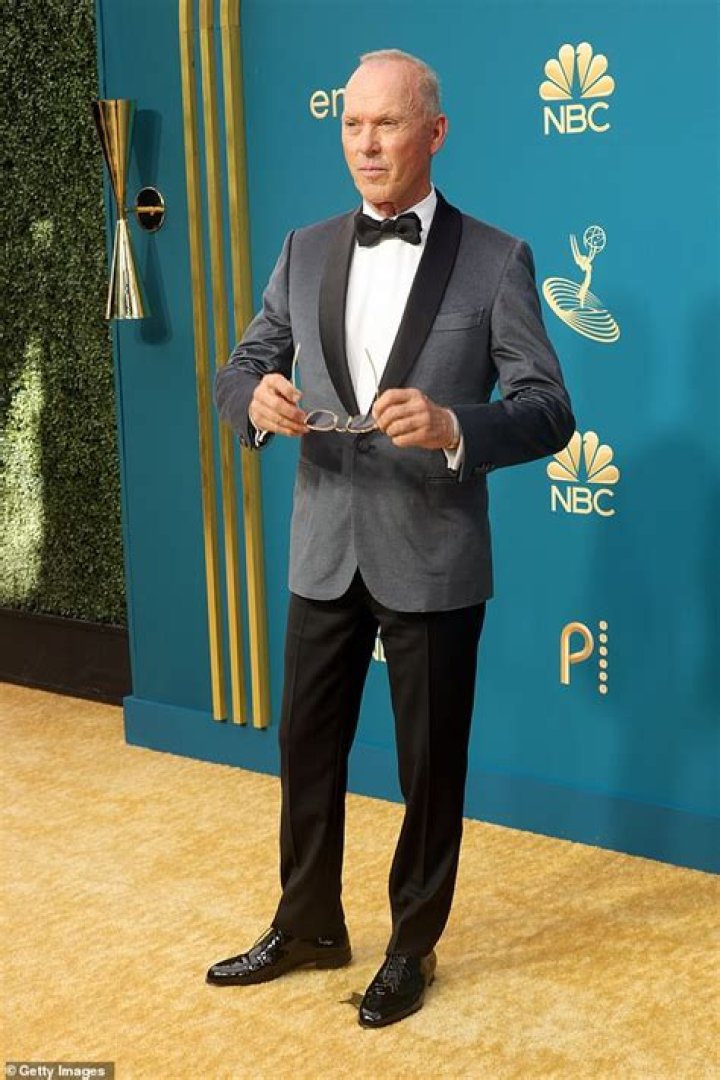Michael Keaton, 71, brings his blonde girlfriend to the Emmys Daily