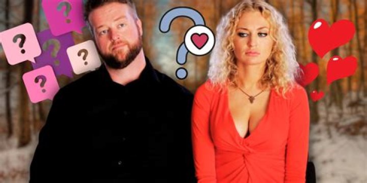 Mike and Natalie from '90 Day Fiancé' hold hands standing far apart.