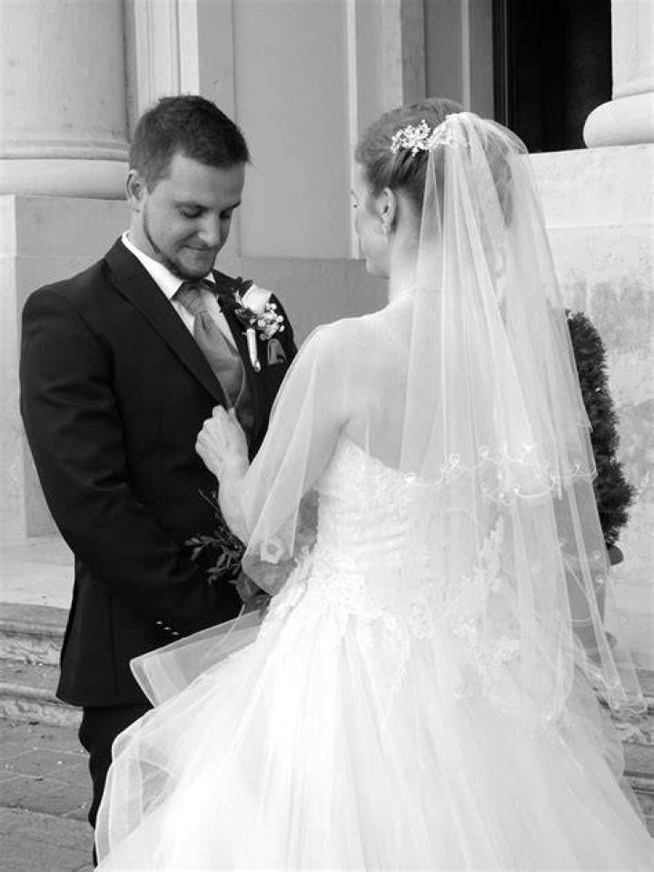Photograph, White, Bride, Facial expression, Dress, Wedding dress, Black-and-white, Bridal veil, Bridal accessory, Gown, Photograph, White, Bride, Facial expression, Dress, Wedding dress, Black-and-white, Bridal veil, Bridal accessory, Gown,