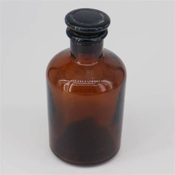 Product, Brown, Liquid, Bottle, Glass bottle, Style, Cosmetics, Black, Grey, Tan, Product, Brown, Liquid, Bottle, Glass bottle, Style, Cosmetics, Black, Grey, Tan,