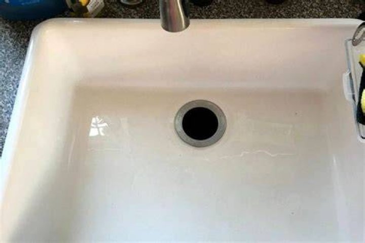 Quick Answer: How Do You Remove Black Marks From Porcelain Sink??