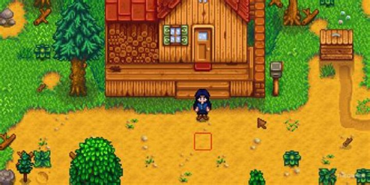 Stardew Valley. The player is using their copper axe to break a large tree stump on their left.