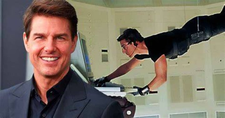 Tom Cruise, who earned a $600 million net worth, poses with Russell Brand in 2012