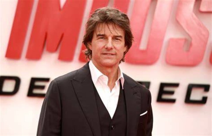 Tom Cruise, whose net worth is $600 million, poses at a 'Top Gun: Maverick' event in London