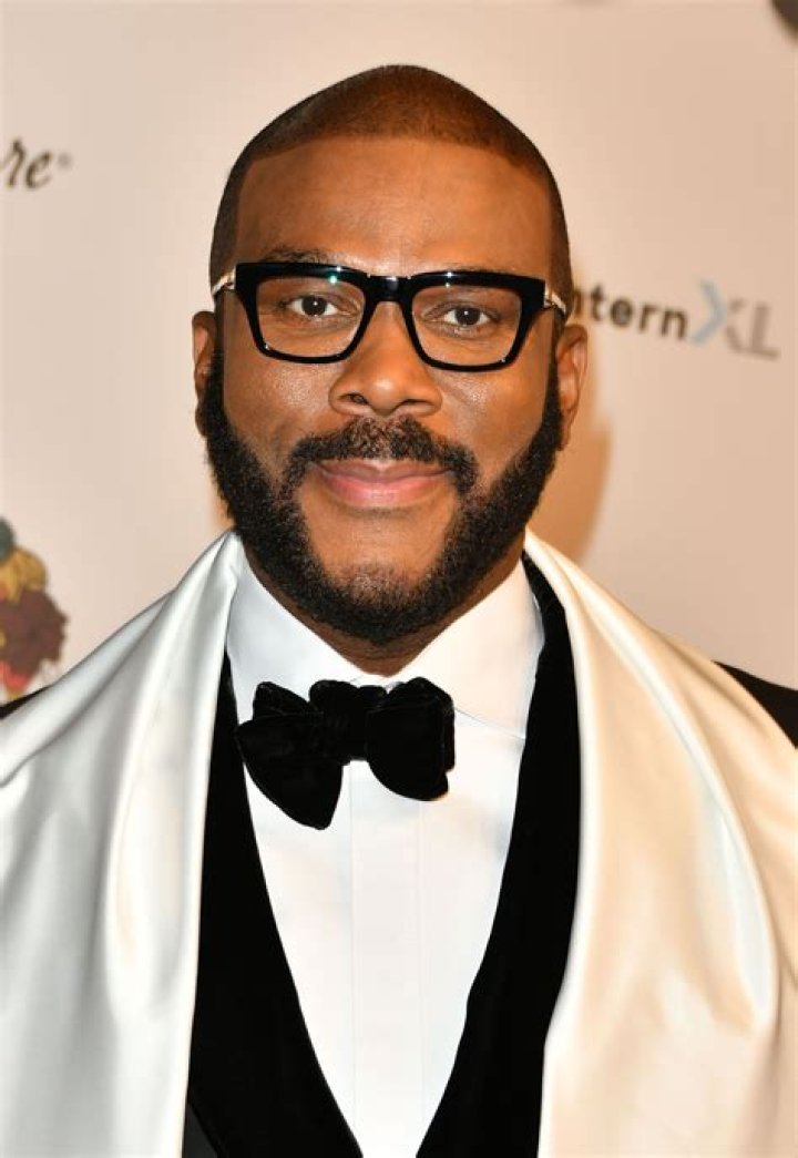 Tyler Perry poses for photo; a video of Perry's $100 mansion recently surfaced on social media