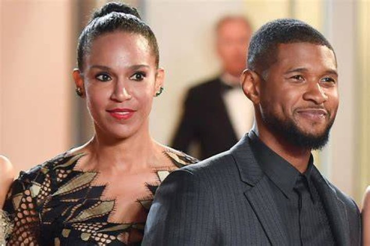 Usher and Grace Miguel Usher (L) and Grace Miguel, wearing Samsung Level headphones, attend the 8th Annual HEAVEN Gala presented by Art of Elysium and Samsung Galaxy at Hangar 8 on January 10, 2015 in Los Angeles, California.