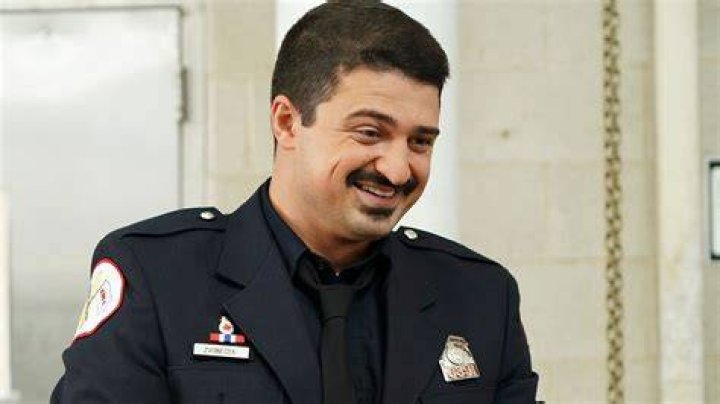 Yuri Sardarov as Otis battles a blaze in season 3 of 'Chicago Fire'